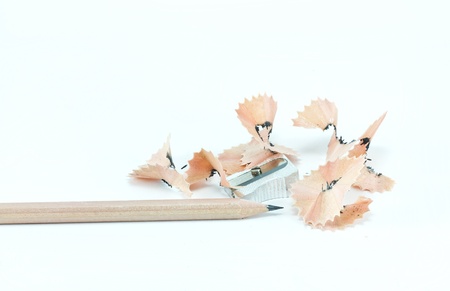 Pencil with sharpening shavings on white backgroundの写真素材