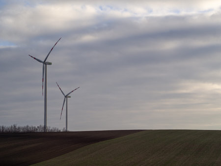 These are windmills at sunset.