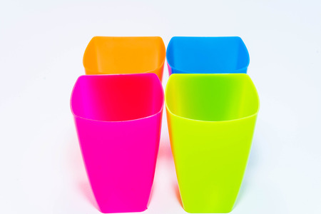 multi-colored plastic mugsの写真素材