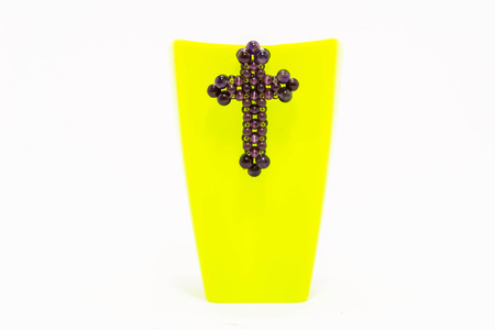 bead cross on plastic mugの写真素材