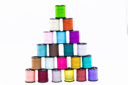 many color of threads lay isolate white background