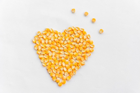 corn seeds array in shape of heartの写真素材