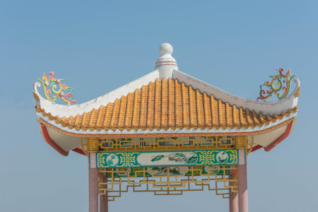nice Chinese pavilion in the pond at blue sky