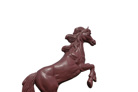 red horse sculpture isolated on white backgroundの写真素材