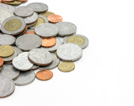 many coins on white backgroundの写真素材