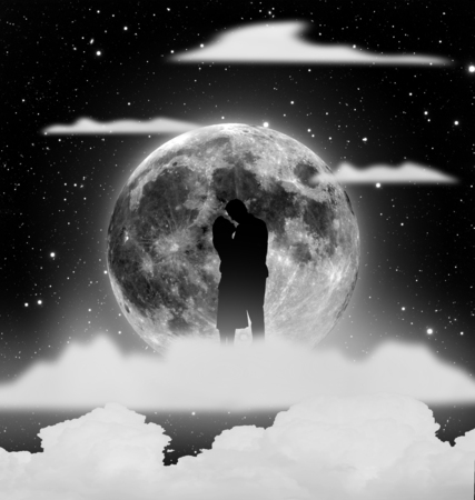 silhouette of couple kissing with moon and cloud background. Elements of this image furnished by NASAの写真素材