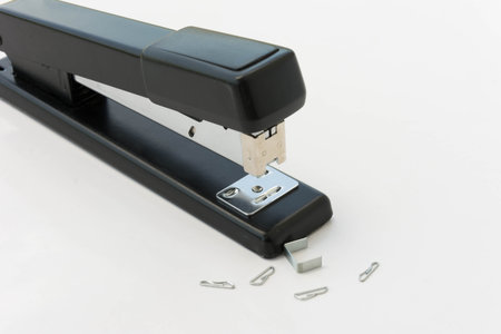 stapler and filling on white backgroundの写真素材