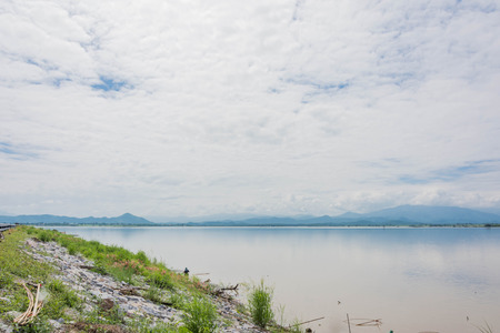 photo view of lake with mountain at sunsetの写真素材