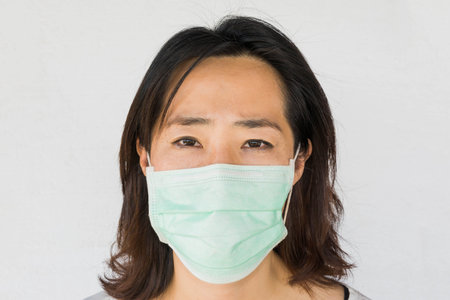 woman with Face mask on white background