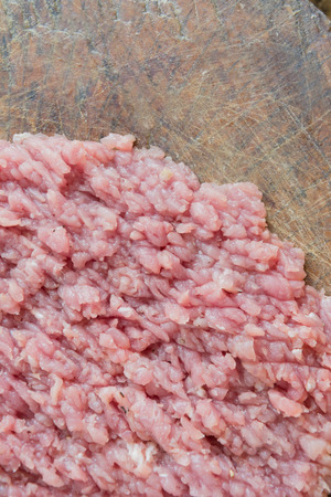 minced pork on chopping blockの写真素材