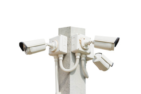 Security CCTV cameras setting on pole isolated on white background
