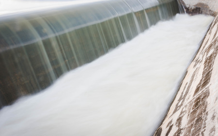 motion blur of waterfall from overflow of dam on rainy season, Nakhonsawan, Thailandの写真素材