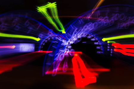 abstract motion blur of light with car's Speedometer illuminated