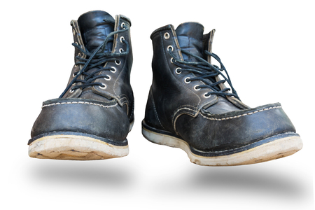 combat boots isolated on white backgroundの写真素材