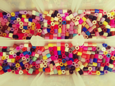 multicolored plastic hama beads toy for kidsの写真素材