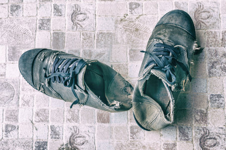 old shoe of student on ground