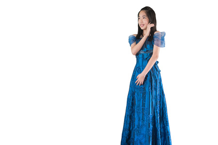 girl with blue long  beautiful dress isolated on whiteの写真素材