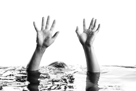 hand raising above water isolated on white in white toneの写真素材