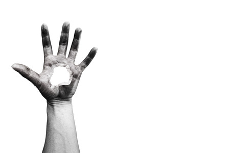 scary hand with hole isolated on white with clipping pathの写真素材