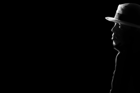 depressed and hopeless man alone in the dark in white tone の写真素材