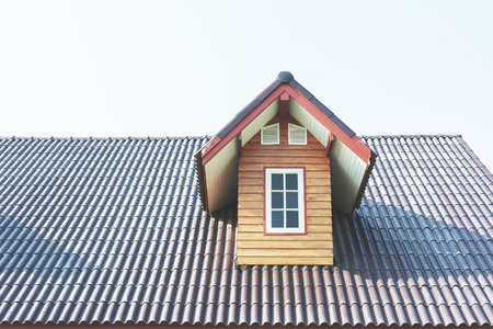 three of triangle end of the roof against the blue skyの写真素材