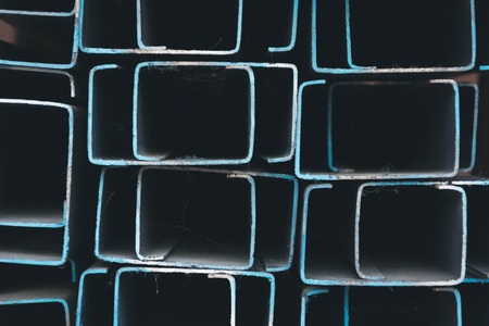 steel rectangular bars of metal on rackの写真素材