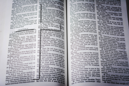 Transparency of cross convex on bibleの写真素材