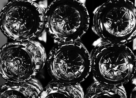 Stack of bottom Of plastic bottles in white toneの写真素材