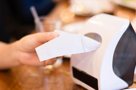 tissue in box pulling by woman, focus of tissueの写真素材
