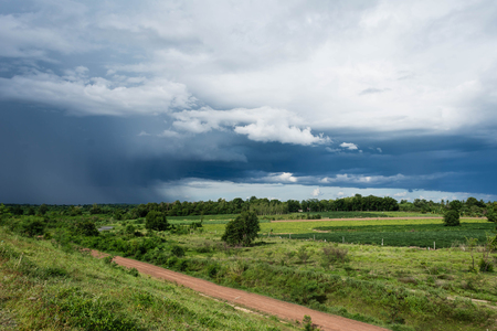 art rural landscape. Field, mountain and lake at sunsetの写真素材