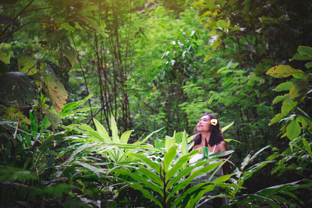 Portrait of beautiful Asian woman enjoy natural outdoor at forest の写真素材