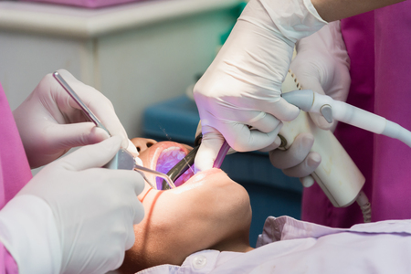 Nakhonsawan, Thailand : 2 March 2018, Dentist and Dentist assistant Checking teeth for children at sanitation.のeditorial素材