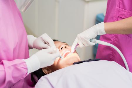 Nakhonsawan, Thailand : 2 March 2018, Dentist and Dentist assistant Checking teeth for children at sanitation.のeditorial素材