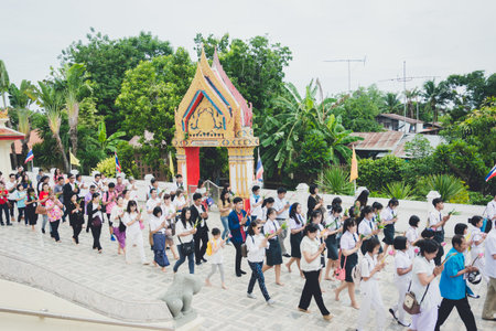 Nakhonsan, THAILAND â May 29, 2017: parade of Walk Candle lit religion traditional procession on The Buddhist Lent Day.のeditorial素材