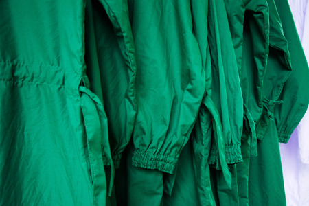 agriculture coat hanging on hanger in control fieldの写真素材