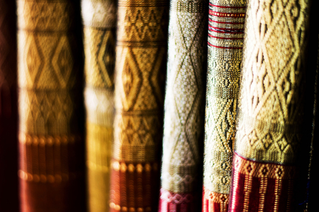 Blurry of Beautiful Thai silk pattern background, shallow depth of fieldの写真素材