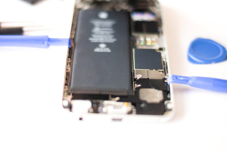 Close-up Of Repairing Cellphone, inside of the phone after open to repair