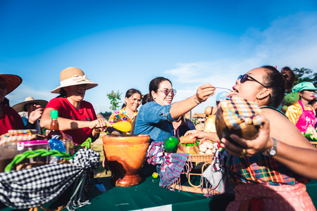 Nakhonsawan,Thailand â September 21 2018 : people having papaya salad contest, having fun and delicious at OTOP Promotion contestのeditorial素材