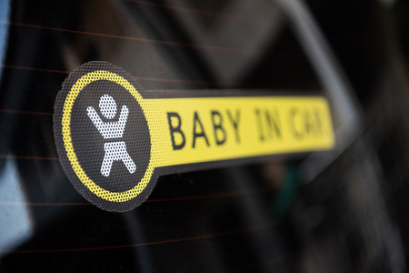 Close-up view of Baby in car sticker on the car on back windows.depth in field shotの写真素材