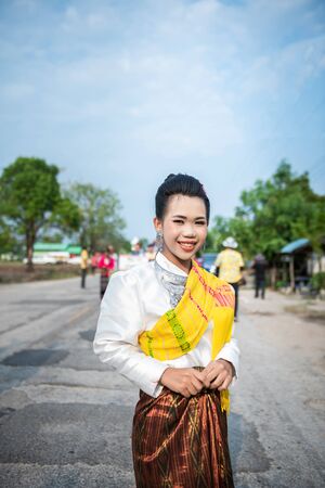 Nakhonsawan,Thailand -MAY 11,2019 : People dress up the characters in the novel walking at the parade of Rocket festival. The celebration for plentiful rains during the rice plant seasonのeditorial素材