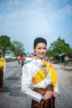 Nakhonsawan,Thailand -MAY 11,2019 : People dress up the characters in the novel walking at the parade of Rocket festival. The celebration for plentiful rains during the rice plant seasonのeditorial素材