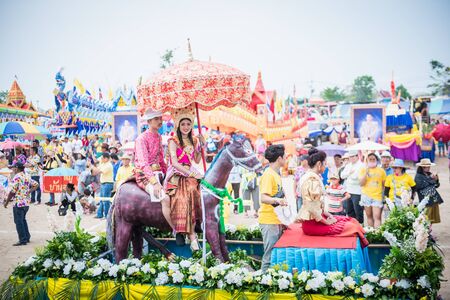 Nakhonsawan,Thailand -MAY 11,2019 : People dress up the characters in the novel walking at the parade of Rocket festival.The celebration for plentiful rains during the rice plant seasonのeditorial素材