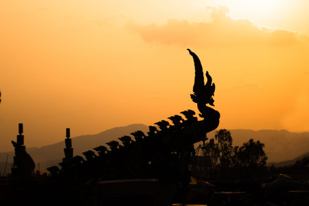 silhouette of Naka head or serpent in buddhist, decorated car in procession of â€œBoon Bang...