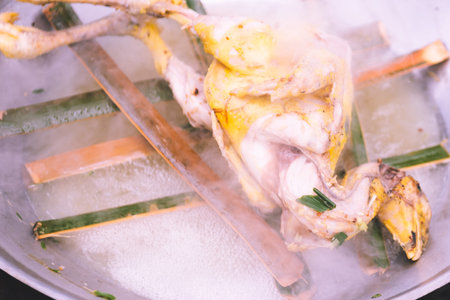 steaming chicken in frying pan, cooking concept