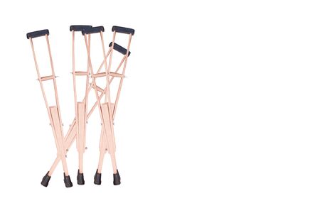 Set of crutches. Elbow crutch, wooden crutch. Medical equipment. Isolated on white.の写真素材