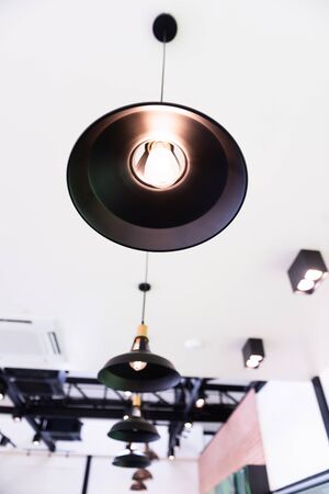 close up of light bulb turn on in socketの写真素材