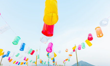 many color of paper lanterns decorated outdoor on Loykratong festival in Thailand