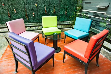 A Set of colorful chairs in living roomの写真素材