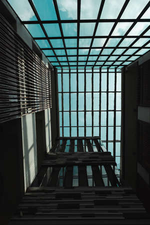 Abstract architectural glass interior of modern house with large windows.のeditorial素材