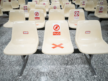 chair for Patients in the hospital with Letter mean do not seat and red mark, social distancing in...